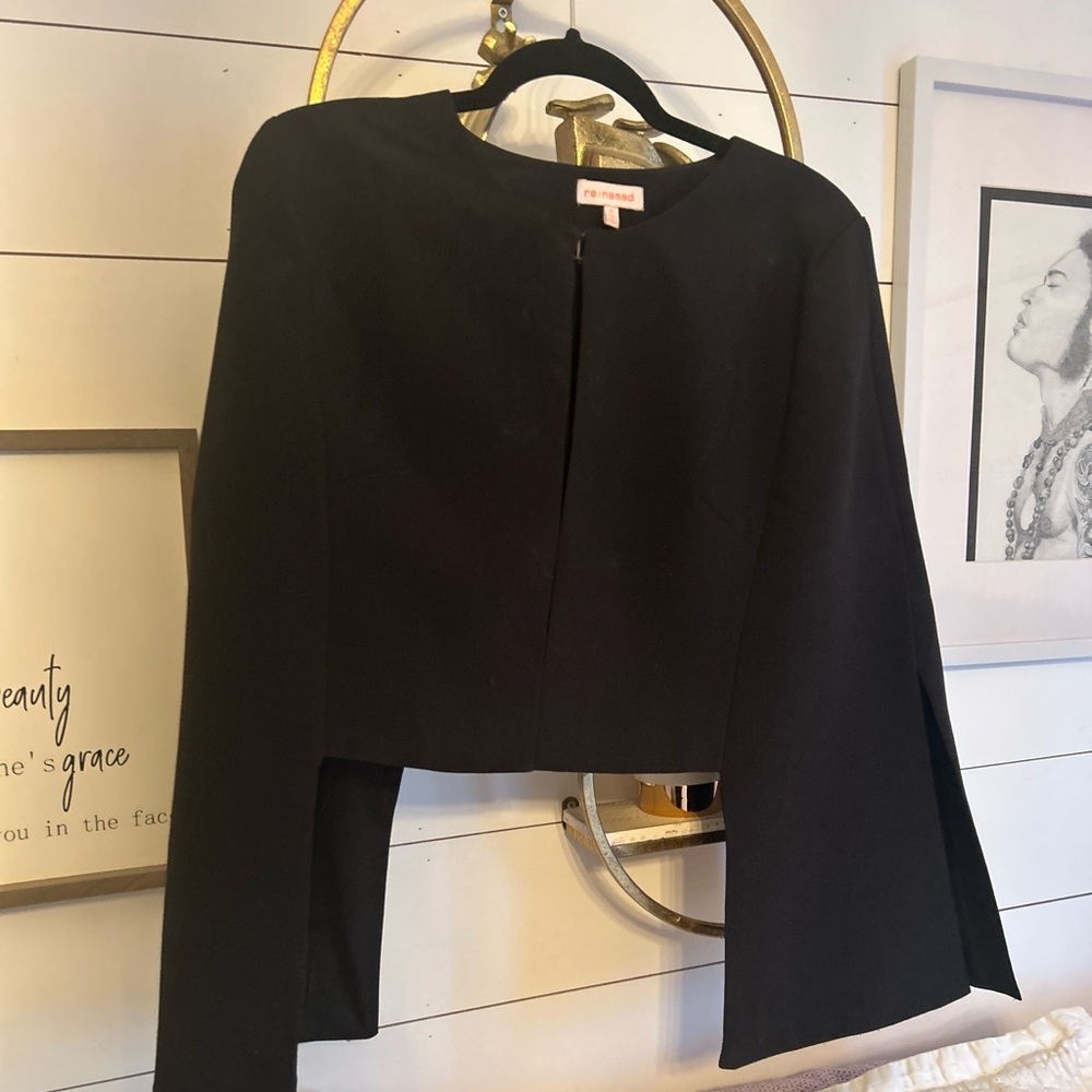 Black cape jacket by Renamed